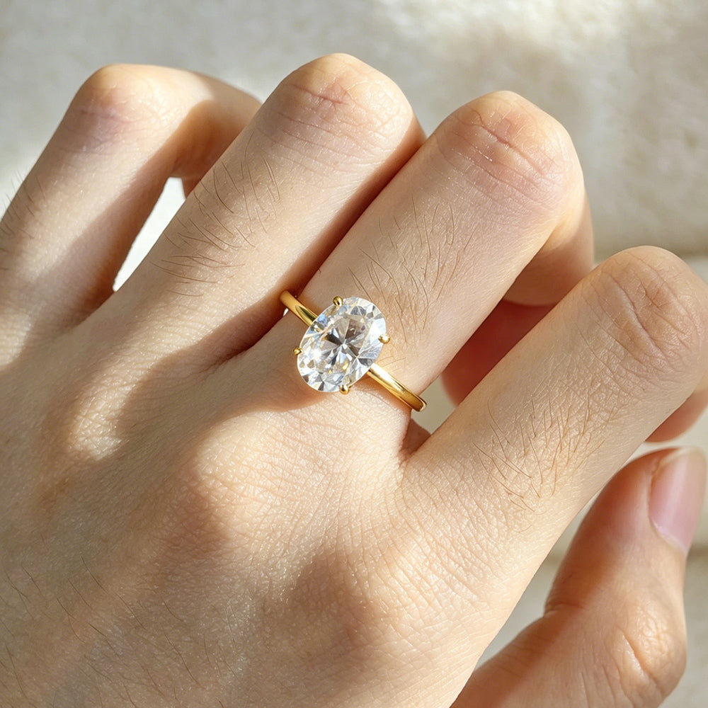 Polished Smooth Band Four-Prong Oval Cut Solitaire Moissanite Ring Set